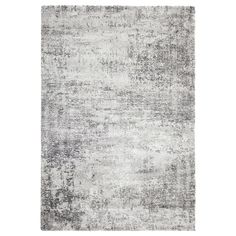 an area rug with grey and white colors