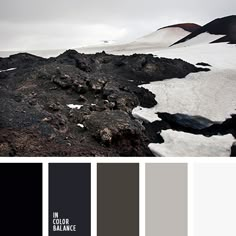 the color scheme is black, gray, and white with some snow on the ground