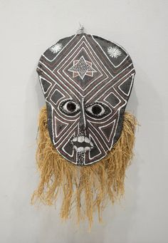 This is a very unique Makishi Mask from the tribal people of Zambia. During the enthronement of chiefs and at other sociopolitical events, Makishi are primarily associated with Mukanda, the complex and often lengthy process of initiating young boys into adulthood. During this crucial transformation, the ancestors return as Makishi to guide, assist, protect, and educate the young boys in their initiation camp and to bring positive spiritual influences to the community hosting the Mukanda. Women a African Mask, Plant Fibres, Overland Park, African Masks, Zambia, The Community, Art For Sale, Sculpture Art, Halloween Wreath