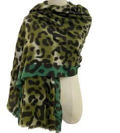 100% Acrylic     75 x 185cm (Approximately)     Mid-weight scarf     Popular leopard print design     Bold fashion accessory     Frayed Edge Colour: Green  Add a pop of pattern to your outfit with this green shawl scarf wrap. The scarf features a unique mix of leopard print and stripes, making it a stylish accessory for any occasion. Made from lightweight polyester, it's comfortable to wear in any season. The versatile pashmina style allows it to be worn in a variety of ways, from a simple wrap Style Pashmina, Pashmina Style, Green Shawl, Green Leopard Print, Animal Print Scarf, Shawl Scarf, Bold Fashion, Shawls And Wraps, Scarf Print