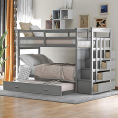 a bunk bed with drawers underneath it in a room