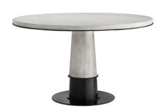 a white table with black pedestals and a round marble top on an iron base