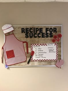 a wooden sign that says recipe for success with an apron and spatula on it