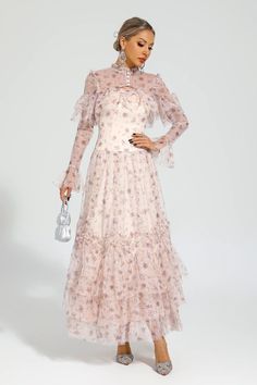 The Clapham Pink Mesh Floral Dress is a meticulously crafted, elegant gown that exudes European court-style charm. This exquisite dress features a blend of fine mesh fabric, intricate floral patterns, and sparkling sequins. The perfect choice for refined gatherings, this unique and sweet outfit will make you stand out at any formal occasion, be it a party or a grand banquet.  Dress Length: Approx 140cm Materials: Polyester Gentle Dry Clean Only  The model is 5 ft 7 and wears size S  Color may va Dresses Event, Mesh Floral Dress, Banquet Dress, Gowns Of Elegance, Wardrobe Style, Floral Patterns, Xl Dress, Formal Occasion, Mesh Fabric