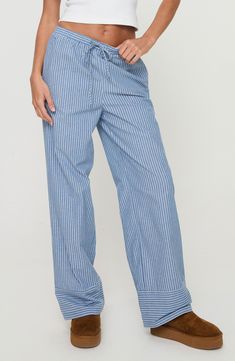 A low-rise drawstring waist tops these cute striped pants cut from a soft cotton blend in a straight-leg silhouette. Elastic/drawstring waist 80% cotton, 20% polyester Machine wash, tumble dry Imported Trousers Street Style, Pants Elastic Waist, Loose Trousers, Fleece Dress, Pants Loose, Outerwear Outfit, Women Pants, Loungewear Sets, Casual Tank Tops