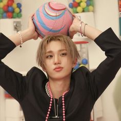 a person with a ball on their head