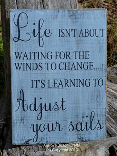 a sign that says life isn't about waiting for the winds to change it's learning to adjust your sails