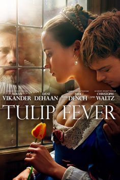 the movie poster for tulip fever with two women looking at each other and one man holding