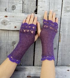 Elegant fingerless gloves gently knitted and crochet in luxurious light weight wool / acrylic. Colors ranging in the velvet shades of purples - from deep plum to bright lilac. It fits most women sizes. Length (unstretched) : 10 inches / 25 cm Width (unstretched) : 3 1/2 inches / 9 cm To complete the accessory set, choose the crochet beret hat in coordinated colors: https://www.etsy.com/listing/469424454/peacock-grace-elegant-crochet-beret-hat?ref=shop_home_active_1 Available in other purple shad Crochet Arm Warmers, Purple Gloves, Crochet Edges, Long Fingerless Gloves, Crochet Gloves Pattern, Blue Gloves, Crochet Beret, Gloves Pattern, Knit Gloves