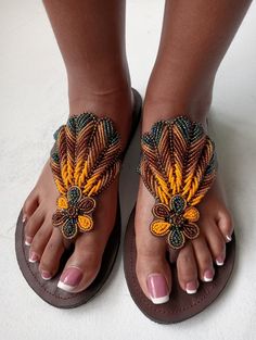 African beaded sandal, women shoes, summer sandal, handmade Sandals, women slippers, wedding and gifts sandal,maasai sandal, flip flop You look super great with this sandals Very beautiful and unique Best for outdoor trips Very durable and stylish 100% handmade using genuine leather and fine beads  We ship via DHL express For wholesale please contact us African Shoes, Handmade Sandals, Beaded Sandals, Women Slippers, Maasai, Shoes Summer, Leather Slippers, Sandals Women, Bead Leather