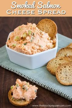 smoked salmon cheese spread in a white bowl with crackers on the side and text overlay that reads smoked salmon cheese spread