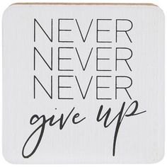 a white sign with black lettering that says never never give up on the front and back