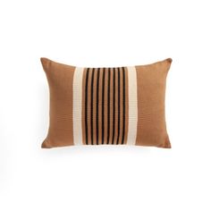 a brown and white striped pillow on a white background with the word's name in black