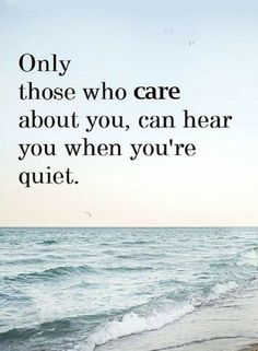 a person walking along the beach with a quote on it that says, only those who care about you, can hear you when you're quiet