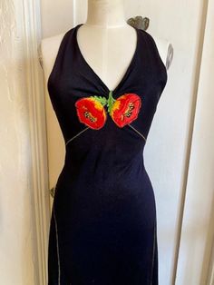 Vintage 70's Black Halter Maxi Dress with Embroidered Poppy Flowers Size Small. Black polyester with beautiful embroidered poppys on front and gold zig zag detail. Halter with long tie at neck and zip back. No label, fits like a small. In good vintage condition. Underarm to underarm - 15" Waist - 14 Long Vintage Dresses, Embroidered Poppy, Black Halter Maxi Dress, Deep Winter, Poppy Flowers, Halter Maxi Dress, Halter Maxi, Black Halter, Halter Maxi Dresses