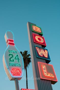 the neon signs are lit up for us to see