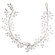 a white background with silver stars and branches in the shape of a wreath on top of each other