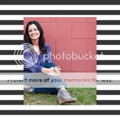 a woman sitting on the ground in front of a brick wall with her arms crossed