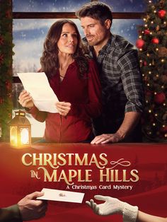 a christmas in maple hills movie poster with a man and woman looking at each other