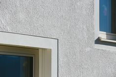 a close up of a window on the side of a building