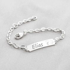 A quality children's ID bracelet made from 925 sterling silver. The filigree silver bracelet has an engravable plate and an enchanting heart pendant. You can have the bracelet engraved with a personal message, your desired name or a date on the front, back or both sides. You have a total of 18 characters including spaces on the front and 12 characters on the back (+6.00 EUR surcharge) at your disposal. Order the engraving on the back with the following link: https://www.etsy.com/de/listing/988579033/zusatzliche-engraving-back-side-for-one?ga_search_query=r%25C3%25BCckseite&ref=shop_items_search_5&frs=1&crt=1 The bracelet is closed with a classic carabiner. It is 14 cm long and has an additional eyelet at 12 cm. The eyelets are professionally soldered by us. All metal elements are made of 9 Silver Adjustable Nameplate Jewelry, Adjustable Silver Nameplate Jewelry, Dainty Silver Name Bracelet For Mother's Day, Personalized White Gold Name Bracelet As Gift, Personalized Dainty White Gold Name Bracelet, Personalized White Gold Dainty Name Bracelet, Dainty Customizable Silver Bracelet, Dainty Personalized White Gold Name Bracelet, Gift White Gold Nameplate Bracelet