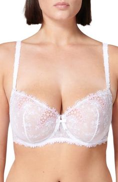 This romantic lace-detailed demi bra provides natural lift and shaping via sheer tulle cups veiled in delicate floral embroidery. 92% polyester, 8% elastane Hand wash, dry flat Imported Delicate Fitted Lace Bra, Delicate Lace Fitted Bra, Sheer Underwire Bra For Wedding, Feminine Lace Bra With Removable Cups, Fitted Lace Bra With Removable Cups, Lace Sheer Bra For Wedding, Wedding Sheer Underwire Bra, Wedding Underwire Sheer Bra, Delicate Lace Wedding Bra