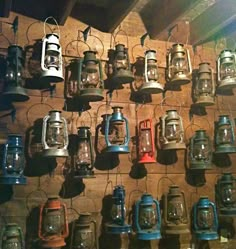 there are many lanterns hanging on the wall