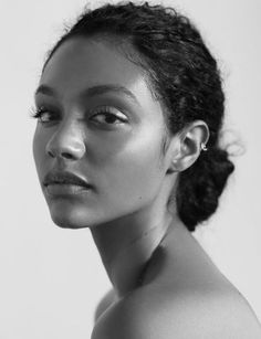 a black and white photo of a woman's face