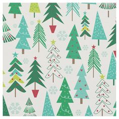 christmas trees and snowflakes on white background with green, red, and blue colors