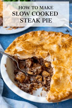 a close up of a pie on a plate with the words how to make slow cooked steak pie