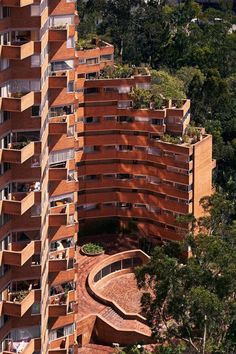 an aerial view of a building with many balconies