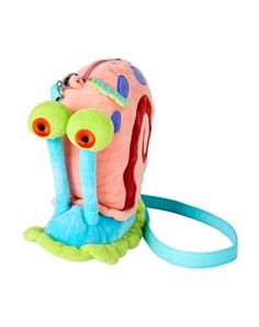 a pink and blue stuffed animal with an eye patch on it's back strap