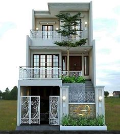 the front view of a two story house with balcony and balconies