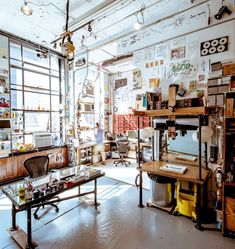 a room filled with lots of clutter and furniture