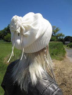 "Long Baggy Slouchy Beanie Ivory Leather Tie Back Women's Tam or Basic Closed Baggy Back Slouch Tam Great Holiday Gifts Medium to heavy weight Cotton Blend Knit with Tie back \"pom pom\" with Faux Suede Leather Ties PLEASE SEE ALL My listings of hats and headbands. MANY GREAT HATS http://www.etsy.com/shop/Vacationhouse?section_id=10416443 Measurements: Length 13\" long KLS/CFT Measurement around Rib 18\".. 26\" fully stretched (One size Medium.baggy loose) models head size is 22.5\" contents: 60 One Size Cream Cap, One Size Cream Beanie For Fall, One Size Cream Hat For Fall, Cream Fall Hat One Size Fits Most, White Hats For Fall, One Size, White Hats For Fall, Cream Beanie Hat For Fall, White Knitted Hat For Fall, White One-size Hats For Fall