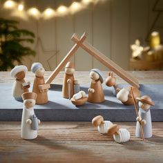 a nativity scene with figurines in the shape of people