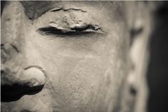 the face of an ancient statue in black and white - stock photo - images