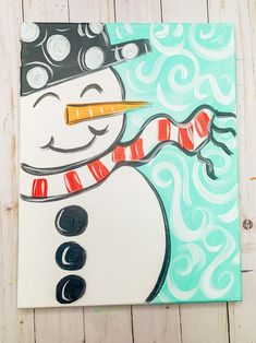 a drawing of a snowman with a hat and scarf