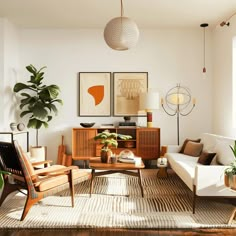 a living room filled with furniture and plants