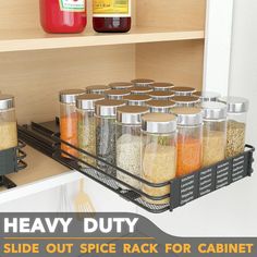 the spice rack for cabinets is open and ready to be put into the cupboards