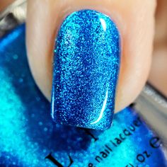 "Blueprint over-delivers in style, vividness, and luxury! This super vibrant electric blue nail polish is sure to make a statement! Practically glowing in the bottle, Blueprint is a dream to wear. There's nothing subtle about this nail polish, you will love it! Blueprint is part ILNP's Ultra Metallic \"Brights\" class of nail polishes; precisely formulated with premium ingredients for truly superior metallic finishes and effortless removal! Fully opaque in 2 to 3 coats." Bright Nail Polish, Blue Glitter Nails, Nail Polish Art, Blue Nail Designs, Bright Nails