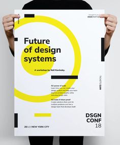 a person holding up a poster with the words future of design systems