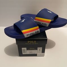 Royal Blue Never Worn Polo Slides. Blue Open Toe Slides With Rubber Sole, Blue Rubber Sole Slides Slip-on, Blue Slip-on Slides With Rubber Sole, Casual Blue Sandals With Rubber Sole, Casual Blue Slide Sandals, Comfortable Blue Sandals With Rubber Sole, Blue Slides With Branded Insole And Round Toe, Blue Cushioned Slip-on Slides, Blue Synthetic Slides With Rubber Sole