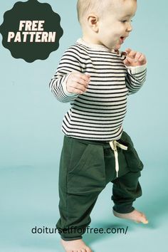 a baby in striped shirt and green pants standing on blue background with free pattern below