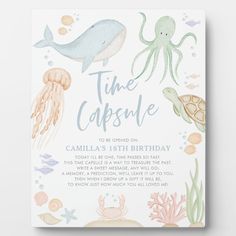 someone holding up a birthday card with an octopus and sea animals on it