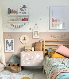 a child's bedroom decorated in pastel colors