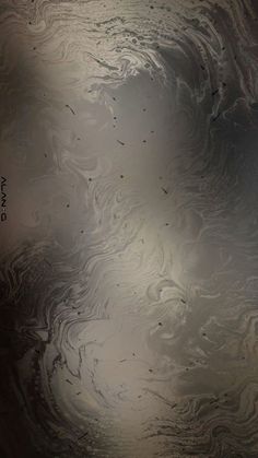 an image of water that looks like it is in the air and has some waves on it