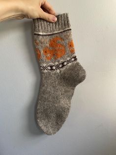 Beige wool socks featuring orange squirrels and white and brown fair isle patterns.  100% wool.  Machine knitted.  If you have any questions please do not hesitate to contact me. Fair Isle Socks Pattern, Scandinavian Style Winter Socks With Fair Isle Pattern, Comfortable Winter Socks With Fair Isle Pattern, Mushroom Socks Knitting Pattern, Hand Knitted Nordic Style Winter Socks, Comfortable Fair Isle Pattern Winter Socks, Fair Isle Socks, Motif Fair Isle, Socks Pattern