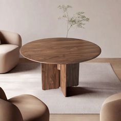 a round wooden table sitting in the middle of a living room next to two chairs