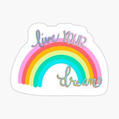 a rainbow sticker that says live your dreams